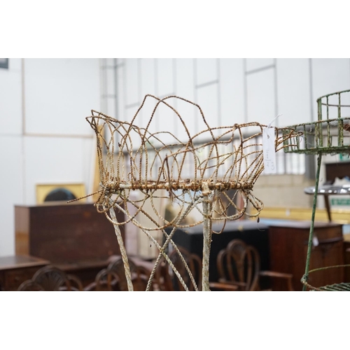 1050 - Two Victorian painted wirework pot stands, larger height 90cm