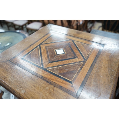 1053 - An early 20th century parquetry inlaid square occasional table and a Victorian and later painted tri... 