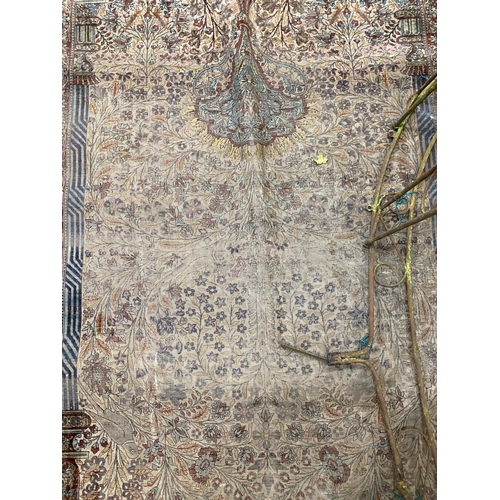 1058 - A Kashan silk medallion rug, worn in places, 194 x 134cm