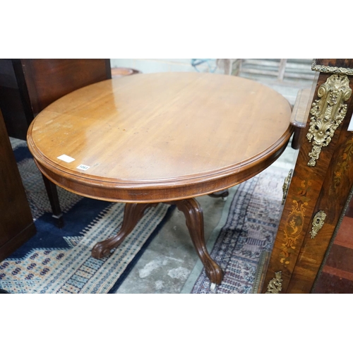 1063 - A Victorian mahogany oval tilt-top loo table width 134cms, depth 104, height 72cms.