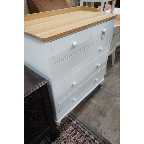 1067 - A modern John Lewis part painted chest of drawers width 101cms, depth 51cms, height 111cms.