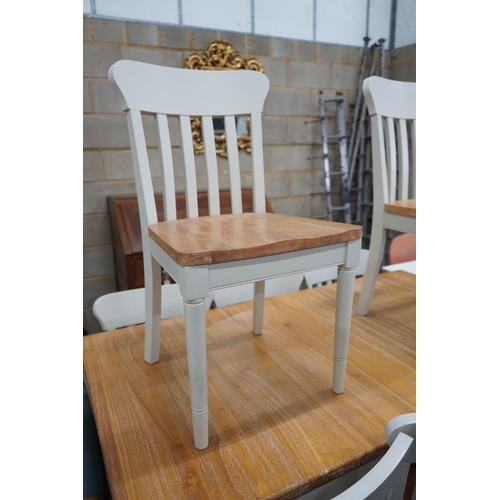 1068 - A modern John Lewis part painted extending dining table and eight matching chairs, table width 209cm... 