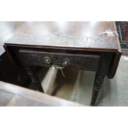 1075 - A Regency mahogany Pembroke table, later carved, width 89cms, depth 47cms, height 66cms.