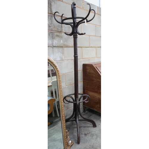 1088 - An early 20th century Thonet style beech Bentwood coat and stick stand, height 199cms.