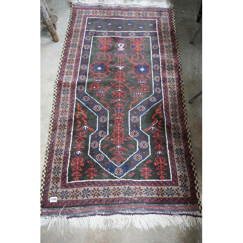 1090 - A Belouch blue ground prayer rug, 140 x 74cm