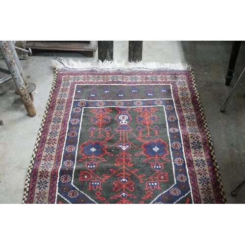 1090 - A Belouch blue ground prayer rug, 140 x 74cm