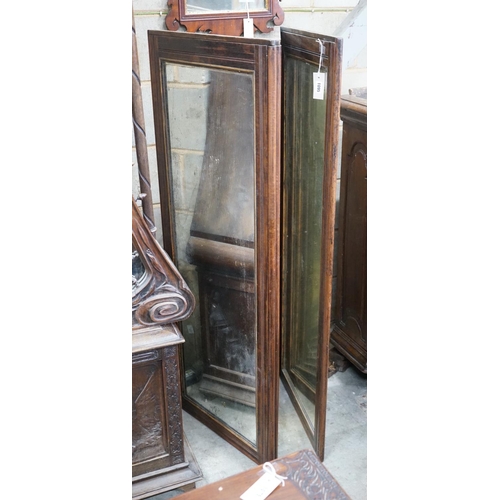 1095 - A late 19th century French mahogany mirrored three fold screen, each panel 53cms x 136cms.