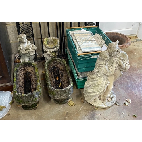 1105 - A small pair of rounded rectangular garden planters, a bird bath and two garden figures