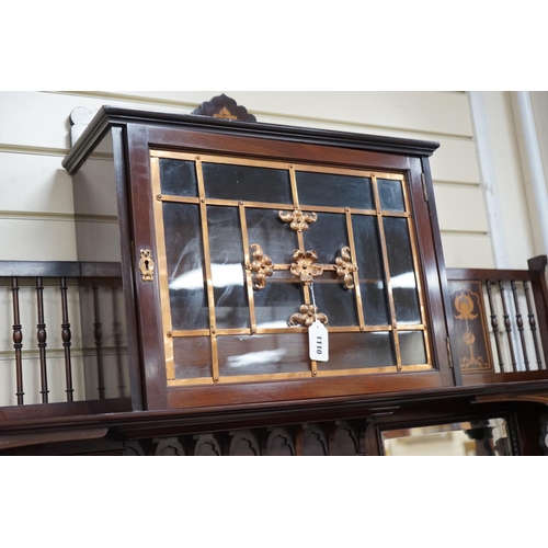 1110 - An Arts & Crafts marquetry inlaid mahogany amaryllis pattern side cabinet, in the manner of Shapland... 