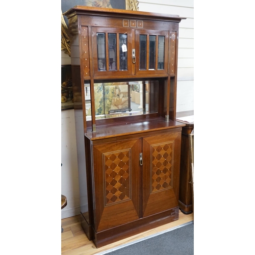 1115 - A Secessionist inlaid mahogany side cabinet with mother of pearl inlay and birds eye maple interior,... 