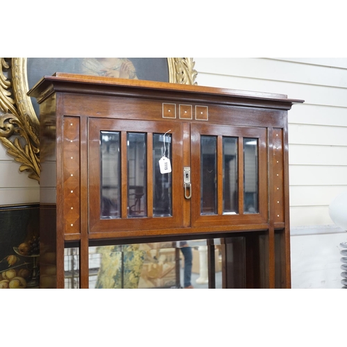 1115 - A Secessionist inlaid mahogany side cabinet with mother of pearl inlay and birds eye maple interior,... 