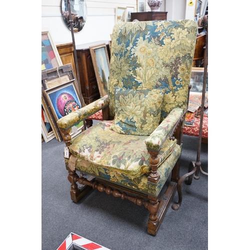 1121 - A 19th century French carved walnut reclining armchair, width 74cm, depth 59cm, height 120cm