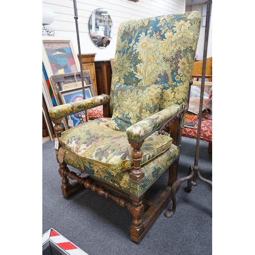 1121 - A 19th century French carved walnut reclining armchair, width 74cm, depth 59cm, height 120cm