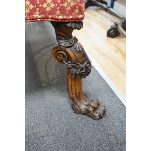 1122 - A Victorian window seat with carved oak lions paw feet, length 140cm, depth 62cm, height 48cm