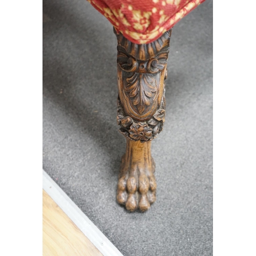 1122 - A Victorian window seat with carved oak lions paw feet, length 140cm, depth 62cm, height 48cm