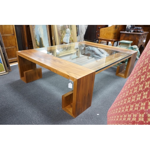 1123 - A contemporary hardwood and plate glass coffee table, length 160cm, depth 120cm, height 45cm