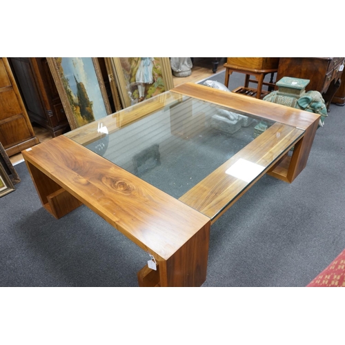 1123 - A contemporary hardwood and plate glass coffee table, length 160cm, depth 120cm, height 45cm