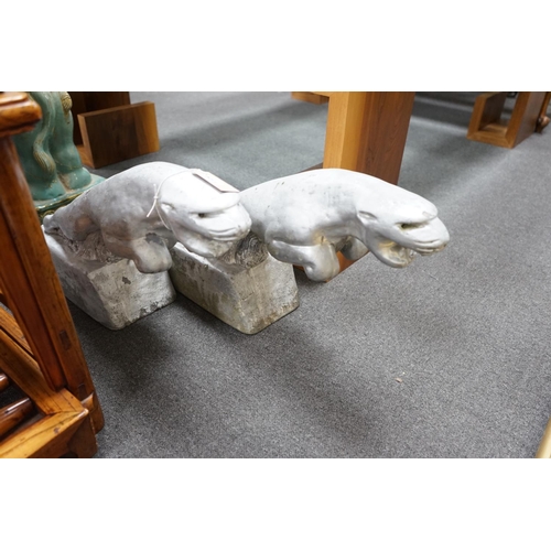 1124 - A pair of painted reconstituted stone Jaguars after F.G. Crosby by repute taken from a car dealershi... 