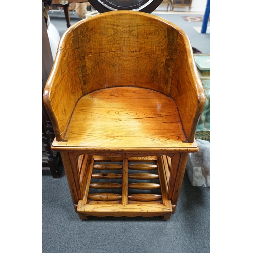 1126 - A pair of Chinese elm armchairs with roller footrests, width 57cm, depth 53cm, height 89cm