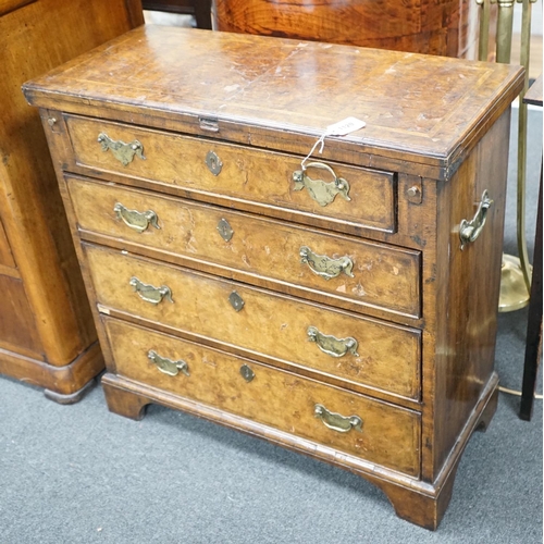 1129 - An early 18th century style feather banded walnut bachelor's chest, width 76cm, depth 34cm, height 7... 