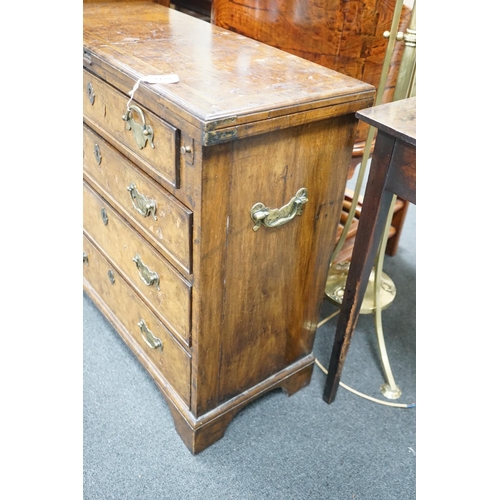 1129 - An early 18th century style feather banded walnut bachelor's chest, width 76cm, depth 34cm, height 7... 