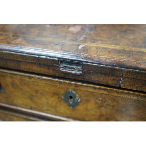 1129 - An early 18th century style feather banded walnut bachelor's chest, width 76cm, depth 34cm, height 7... 