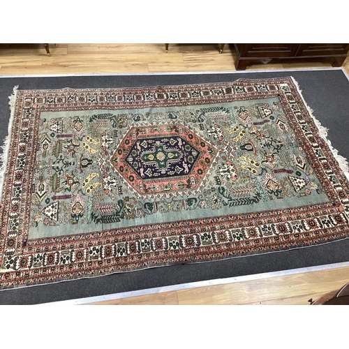 1130 - A Turkish faded blue ground carpet, 264cm x 170cm