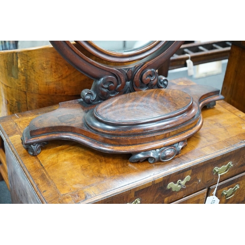 1131 - A Victorian mahogany toilet mirror with compartment base, width 66cm, height 82cm