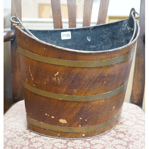 1146 - A Regency Toleware bucket with simulated mahogany and brass effect