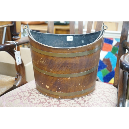 1146 - A Regency Toleware bucket with simulated mahogany and brass effect