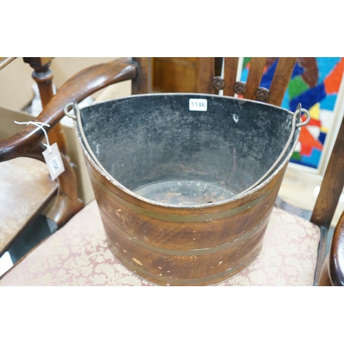 1146 - A Regency Toleware bucket with simulated mahogany and brass effect