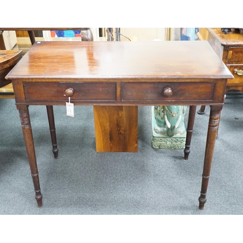 1148 - A Regency mahogany two drawer side table with moulded edge on turned legs, width 95cm, depth 51cm, h... 