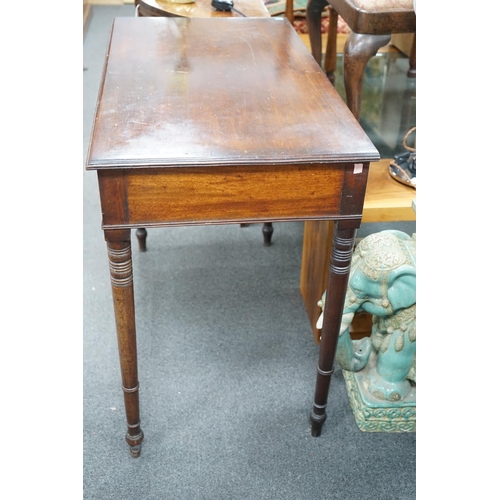 1148 - A Regency mahogany two drawer side table with moulded edge on turned legs, width 95cm, depth 51cm, h... 