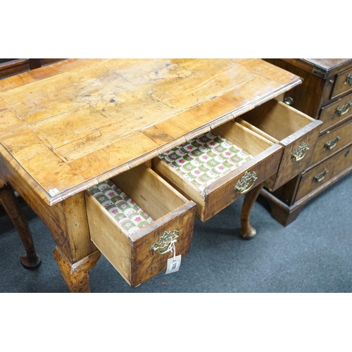 1150 - A George I walnut lowboy with quarter veneered top, width 87cm, depth 55cm, height 74cm