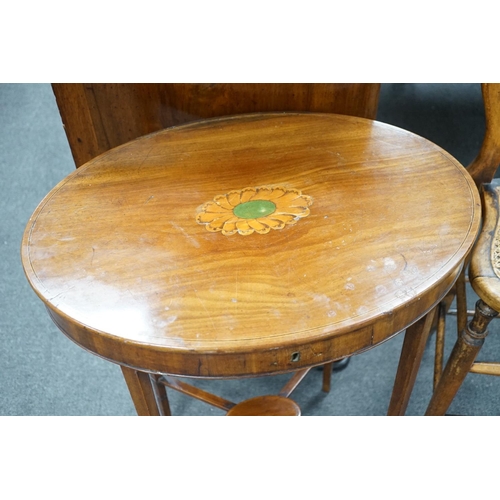 1154 - A Victorian caned beech child's correction chair and an Edwardian inlaid mahogany oval occasional ta... 