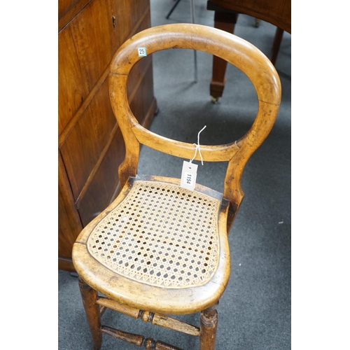 1154 - A Victorian caned beech child's correction chair and an Edwardian inlaid mahogany oval occasional ta... 