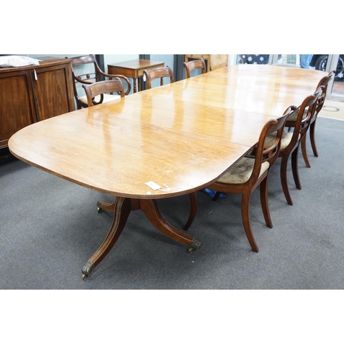 1155 - A George IV mahogany triple pedestal extending dining table, length 341cm extended, two spare leaves... 