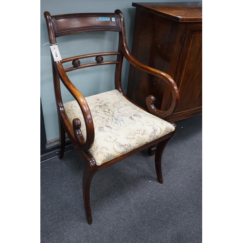 1156 - A harlequin set of eight Regency and later mahogany dining chairs on sabre legs, two with arms... 