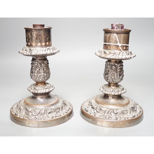 1250 - A pair of Victorian silver plated ships storm light candlesticks, glass funnels missing, 19cms high... 