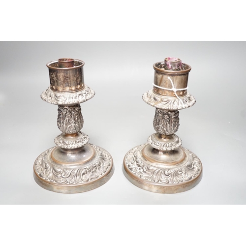 1250 - A pair of Victorian silver plated ships storm light candlesticks, glass funnels missing, 19cms high... 