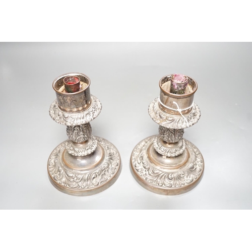 1250 - A pair of Victorian silver plated ships storm light candlesticks, glass funnels missing, 19cms high... 