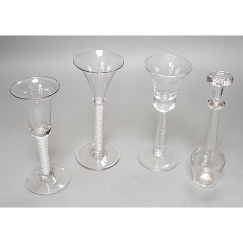 1252 - Three opaque or airtwist stem drinking glasses together with a Toddy lifter - 18cm high