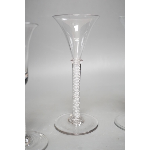 1252 - Three opaque or airtwist stem drinking glasses together with a Toddy lifter - 18cm high