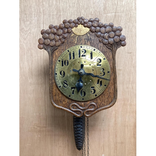 1261 - An early 20th century German Jugendstil oak wall timepiece, four miniature Black Forest timepieces a... 