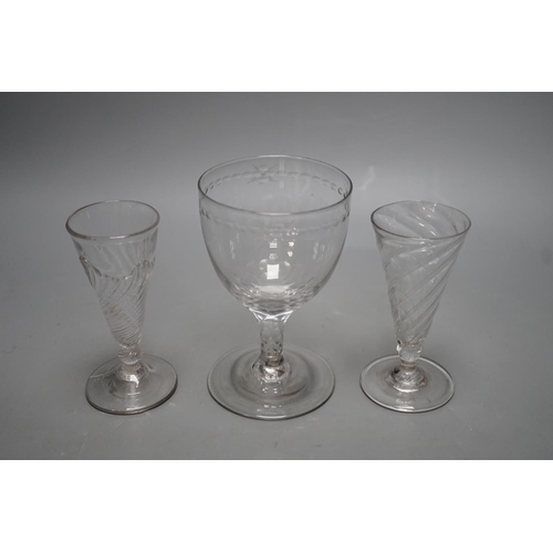 1264 - Two wrythen ale flutes, 18th century and a facet stem OXO glass rummer, tallest 15cms high