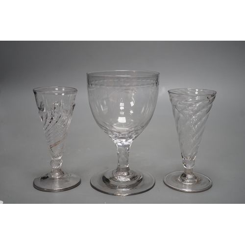 1264 - Two wrythen ale flutes, 18th century and a facet stem OXO glass rummer, tallest 15cms high