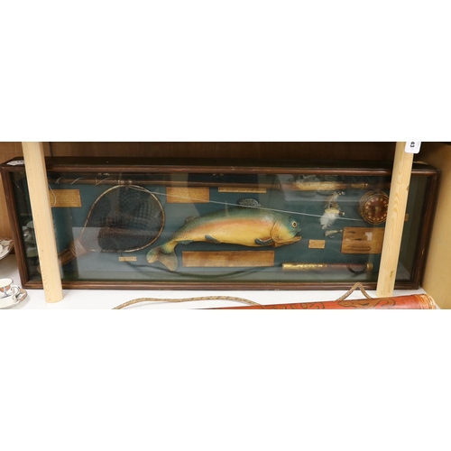 1265 - A cased fishing display case of a Rainbow Trout centred around angling ephemera, 106 x 34cm