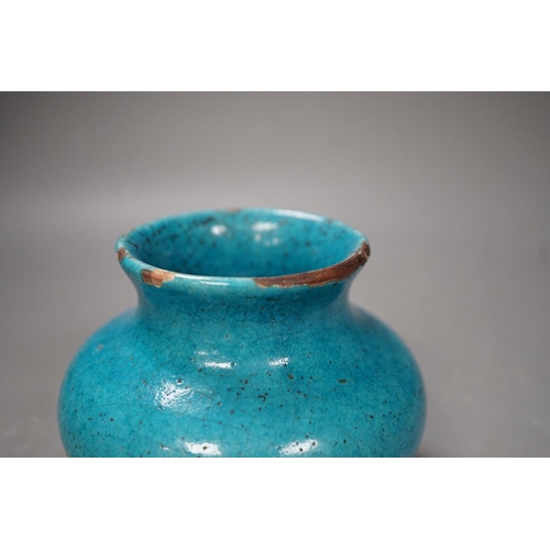 1298 - A Kashan style turquoise glazed vase. 10cm tall