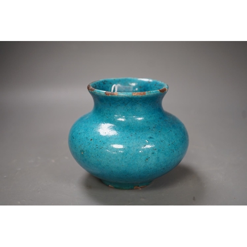 1298 - A Kashan style turquoise glazed vase. 10cm tall