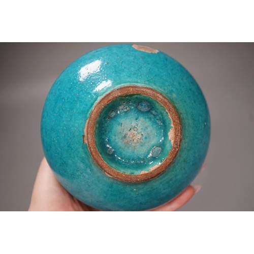 1298 - A Kashan style turquoise glazed vase. 10cm tall